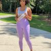 Dr Eva B in purple workout clothes